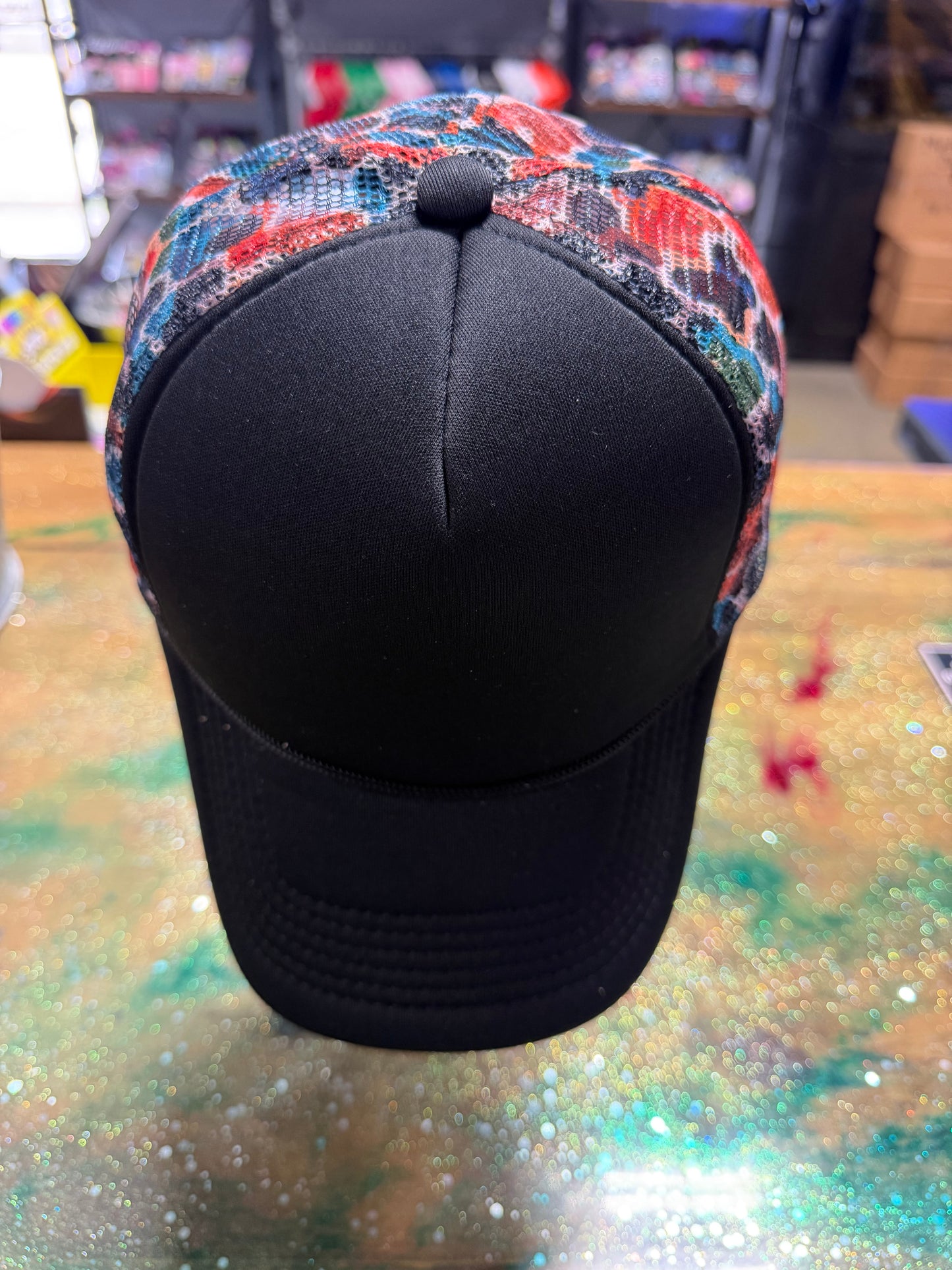 Black Bill and Front with Multi Color Camo Back - Trucker