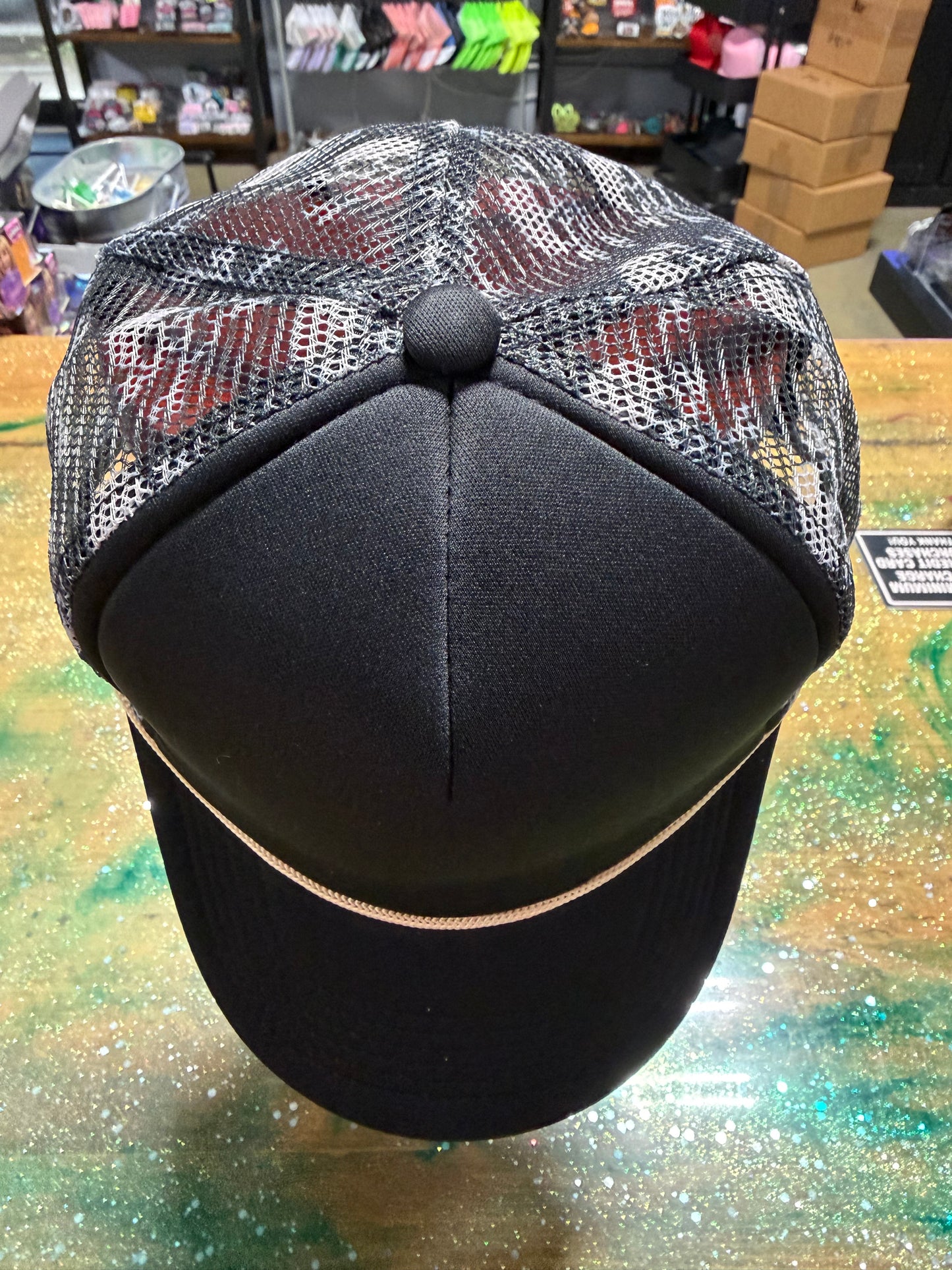 Black Front and Bill with Skulls on Back - Trucker Hat